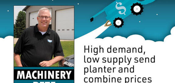 Machinery Pete smiles outdoors next to text on planter and combine prices rising from high demand, low supply.