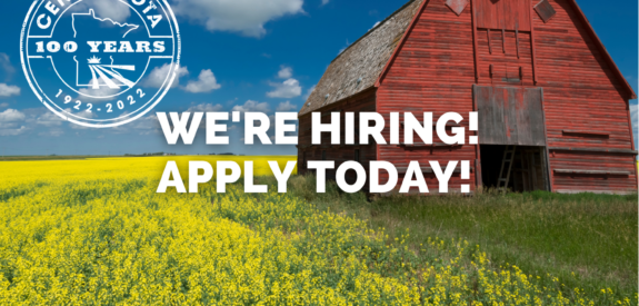 Red barn in a yellow field under blue sky with “We’re Hiring! Apply Today!” text and Centra Sota logo.