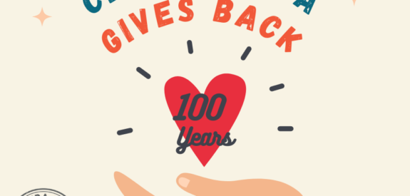 Hand holds a heart reading “100 years,” with “Centra Sota Gives Back” above and logo in the lower left corner.