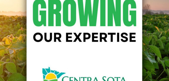 Sunrise over a field with “Growing Our Expertise” text and the Centra Sota Cooperative logo in front.