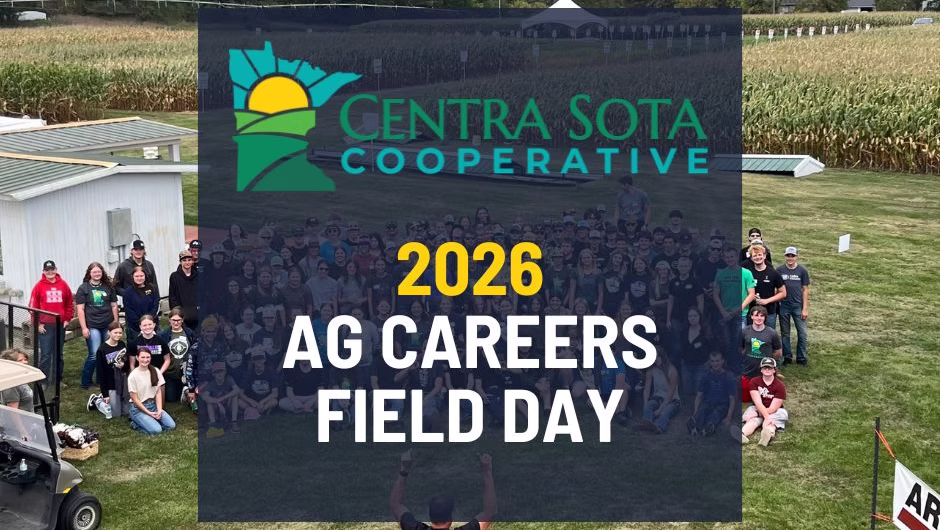 People stand outside behind a sign that says 2026 Ag Careers Field Day, Centra Sota Cooperative.